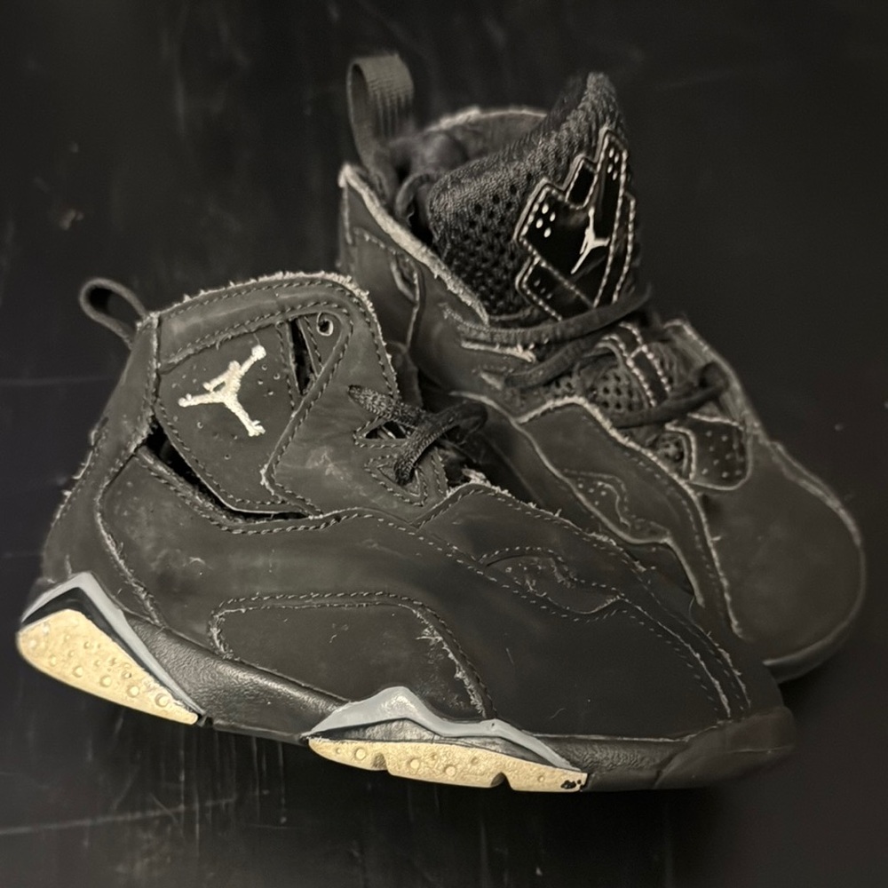 Jordan 7 Black Sneakers with Iconic Jumpman Logo